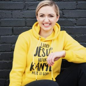 Anna Quinn wearing yellow Modest Muscle hoodie